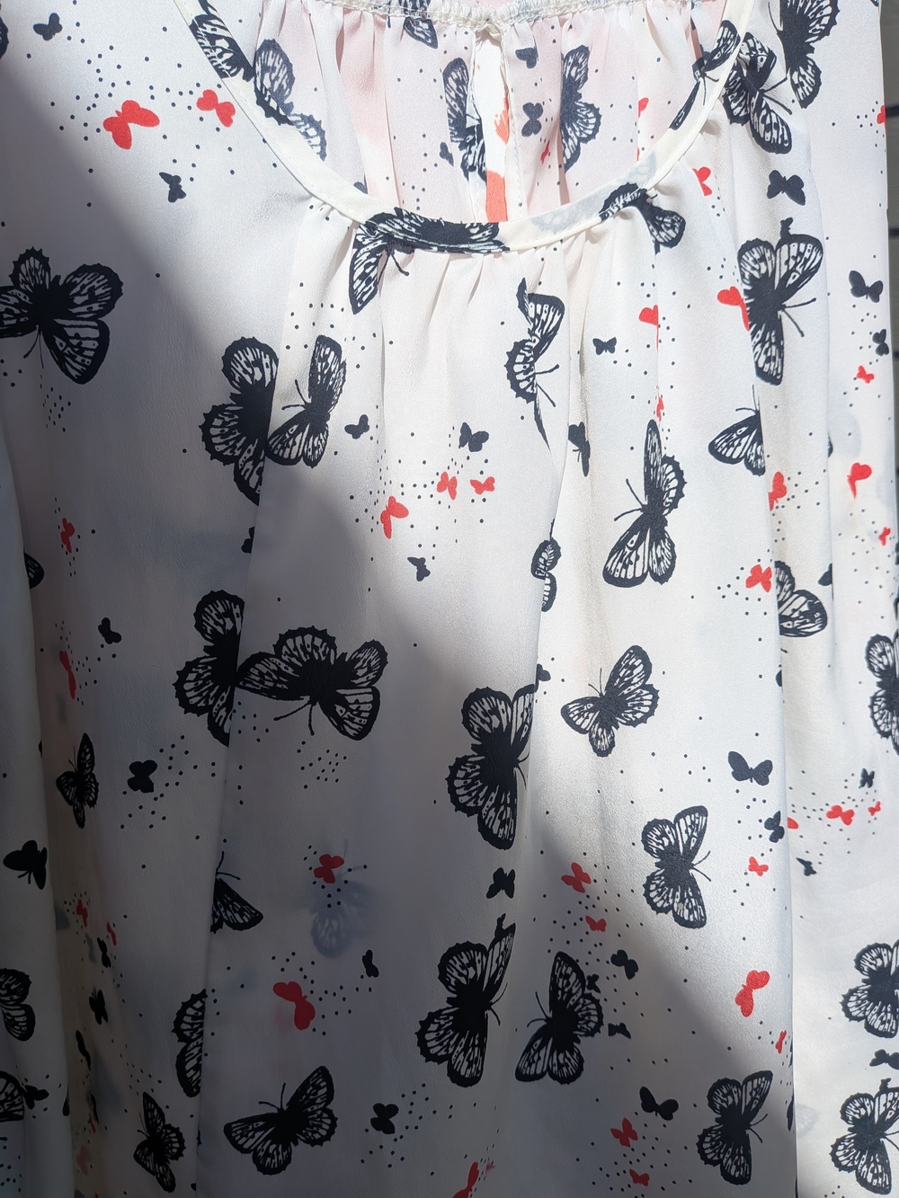 Elle White Butterfly Print Top with Black and Coral Accents